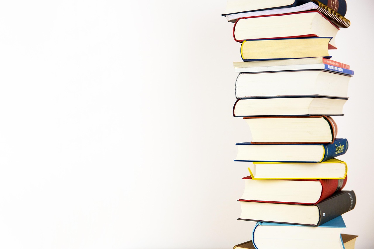 Books, stack, literature — ADB-Butinaca - Chemical Structure and Scientific Research Overview