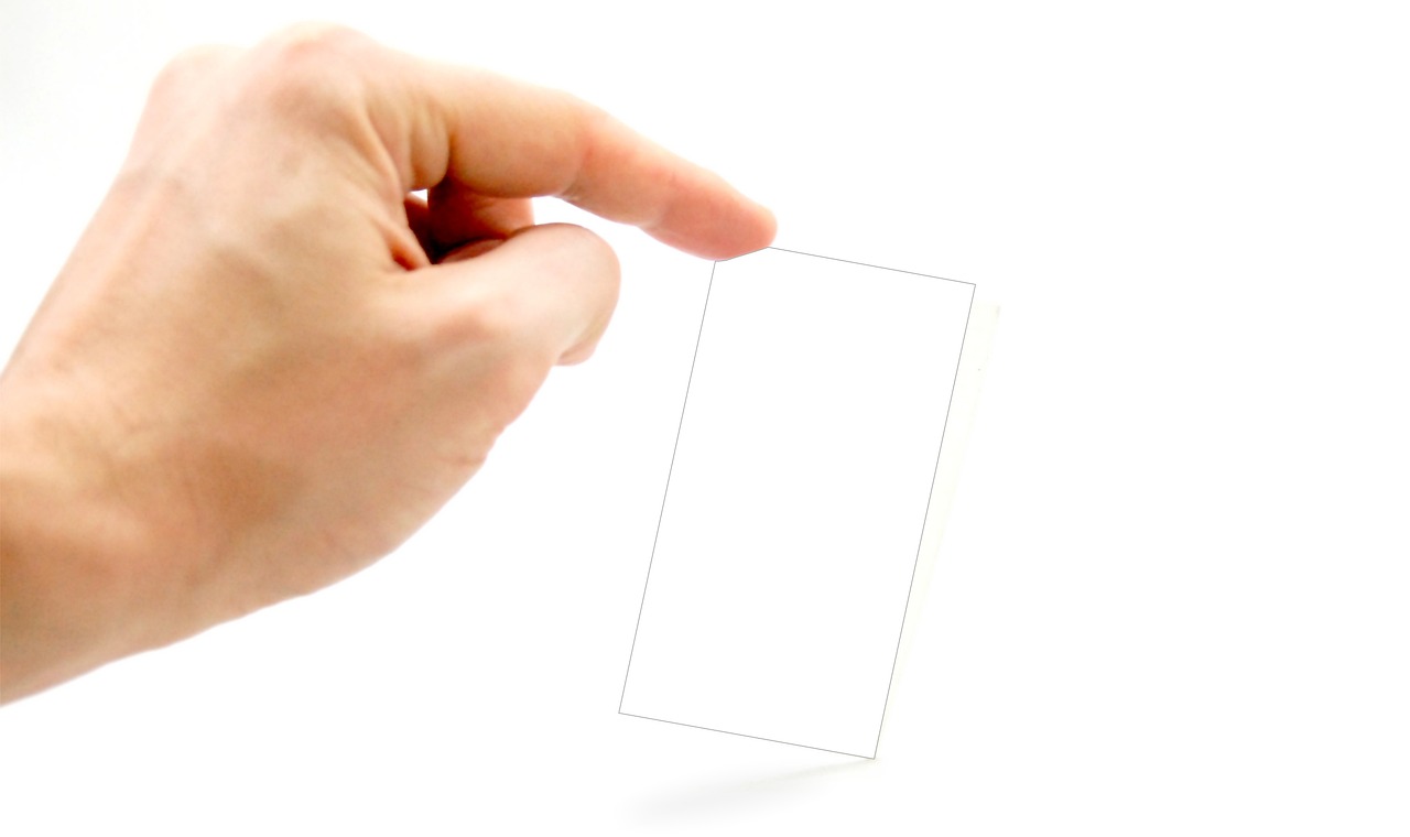 Business card, business, hand — Credit Risk Scoring: Assessing the Likelihood of Borrower Default Using Historical Behaviour
