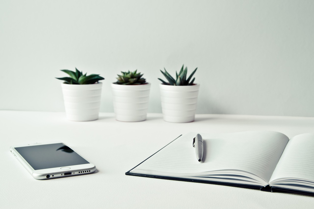 Desk, smartphone, iphone — Do Not Get Stuck In Life Due To Bad Network Connectivity In Your Building