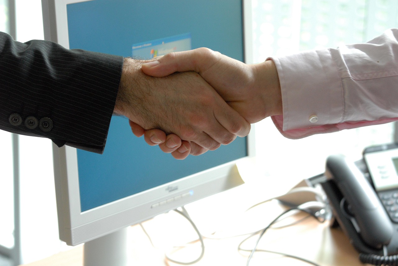 Hand shake, business, professional — Embarking on a Prosperous Path: How to Successfully Enter the Real Estate Business