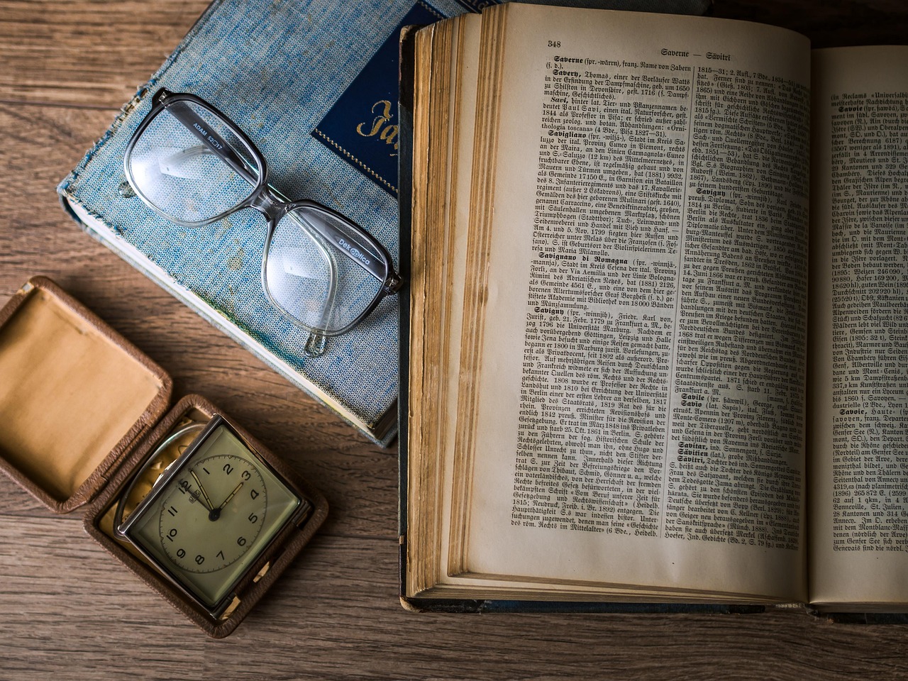 Book, glasses, watch — Online Study: Tips For Studying Online