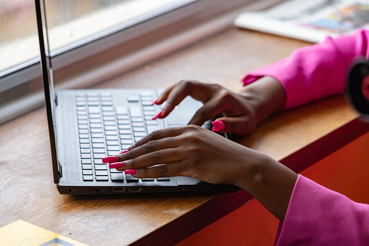 Laptop, typing, working — SEO For Small Businesses: The Essentials
