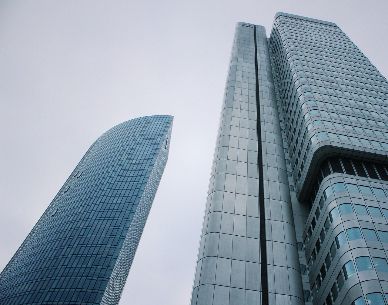 Skyscraper, corporate, modern buildings — Why the World Needs Health Aide Workers
